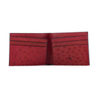 A red ostrich-textured leather bifold wallet shown open against a plain white background, featuring multiple card slots and a debossed 'W' logo on the right pocket.