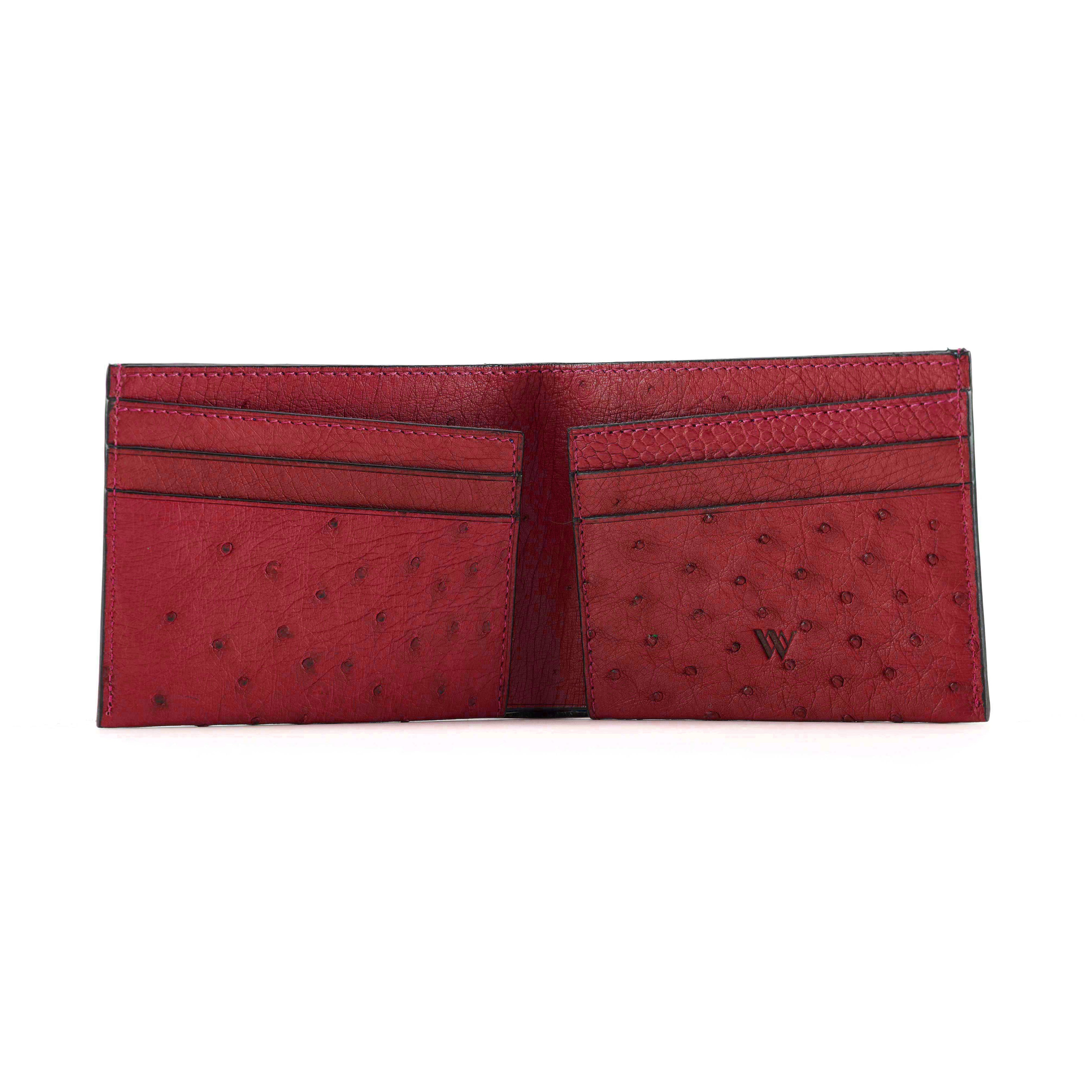 A red ostrich-textured leather bifold wallet shown open against a plain white background, featuring multiple card slots and a debossed 'W' logo on the right pocket.