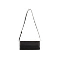 Black woven handbag with a strap on a white background