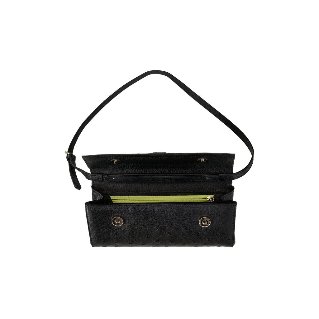 Black handbag with a strap on a white background