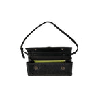 Black handbag with a strap on a white background