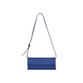 Blue clutch bag with a strap on a white background