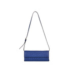 Blue clutch bag with a strap on a white background