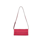 Pink handbag with a strap on a white background