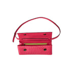 Pink handbag with a red strap on a white background