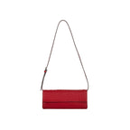 Red clutch bag with a strap on a white background