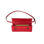 Red handbag with a strap on a white background