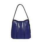 Blue handbag with a textured pattern on a white background