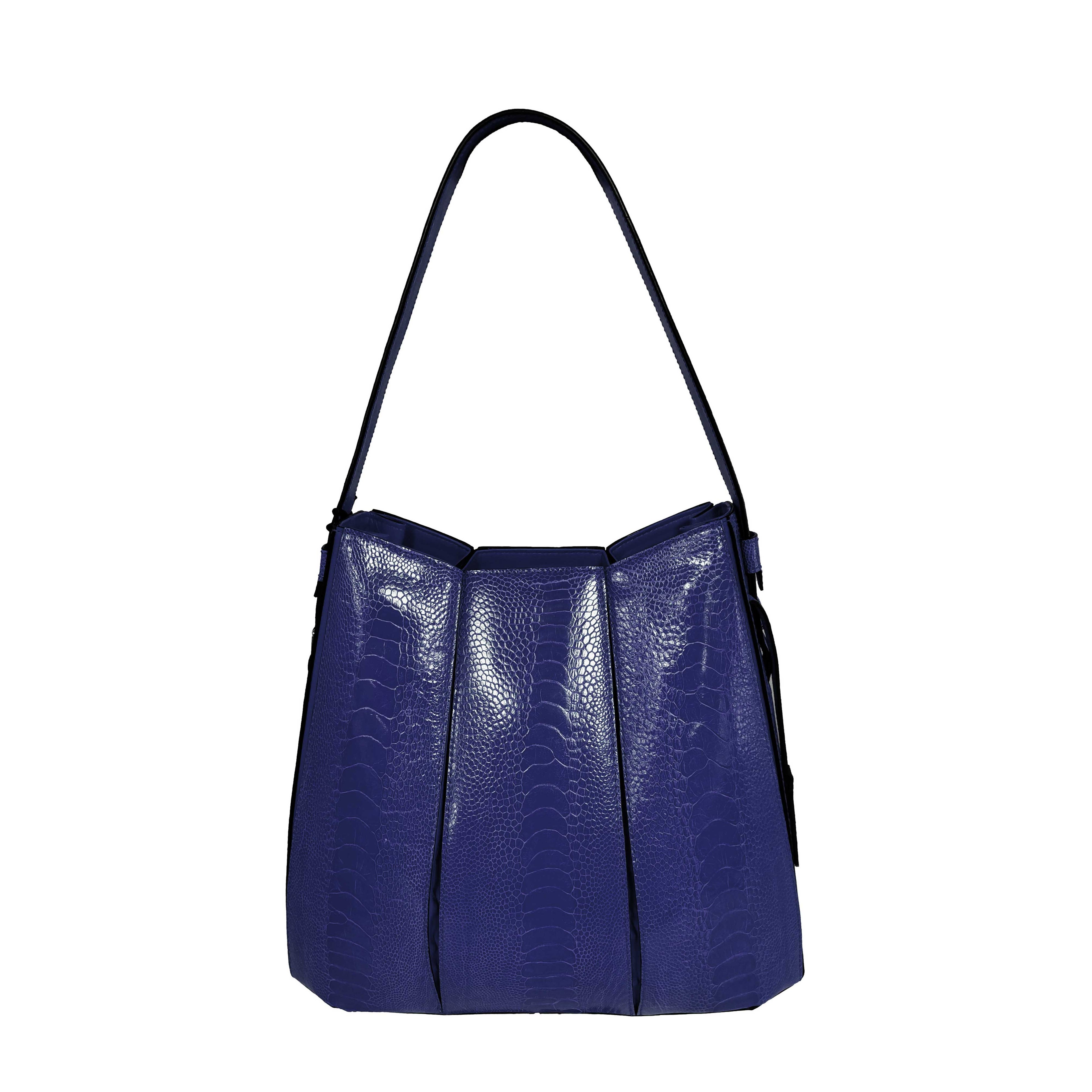 Blue handbag with a textured pattern on a white background