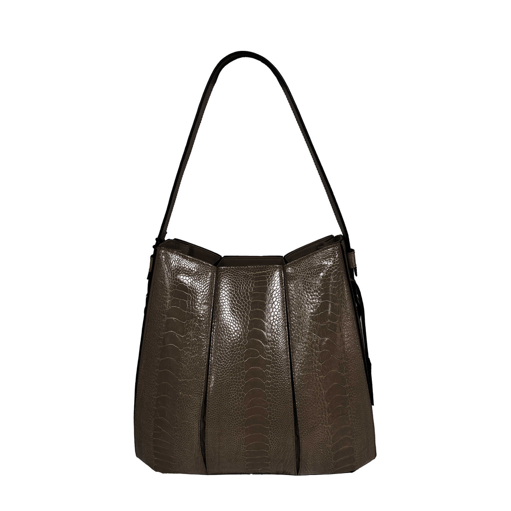 Brown textured handbag on a white background