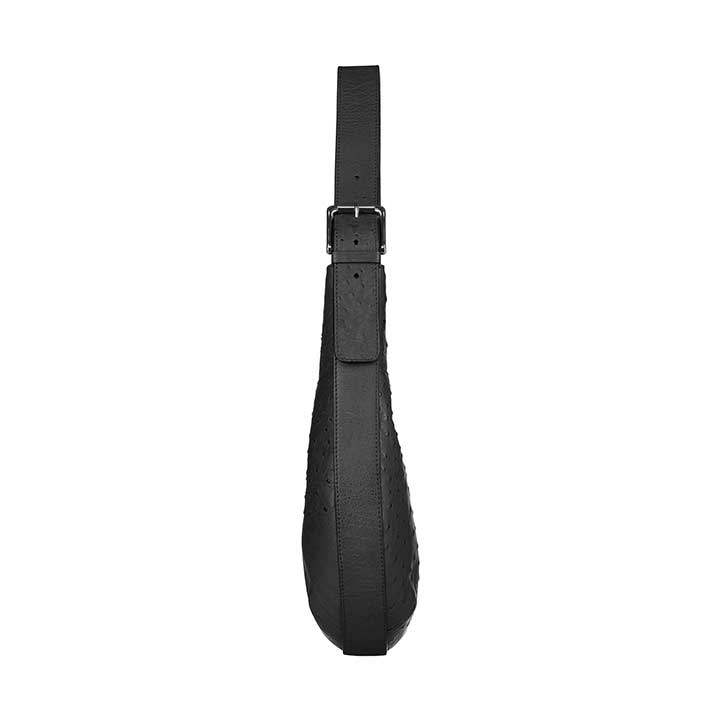 Black leather strap with buckle on a white background