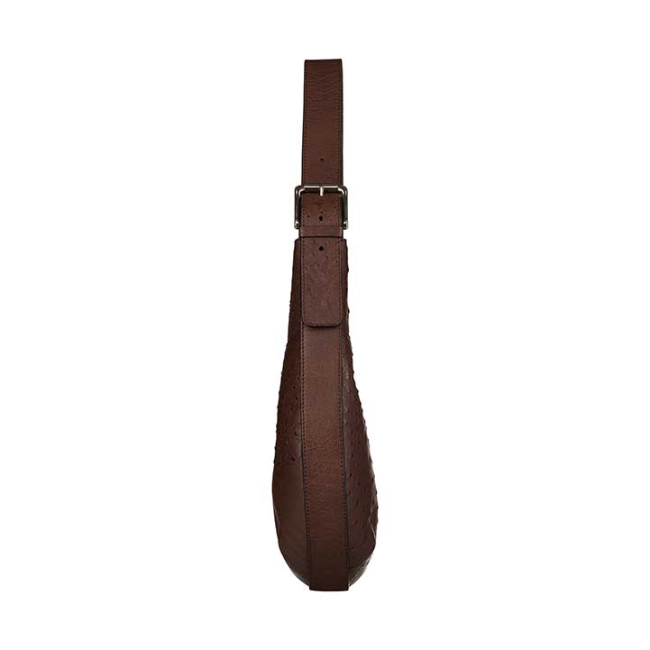 Brown leather strap with buckle on a white background