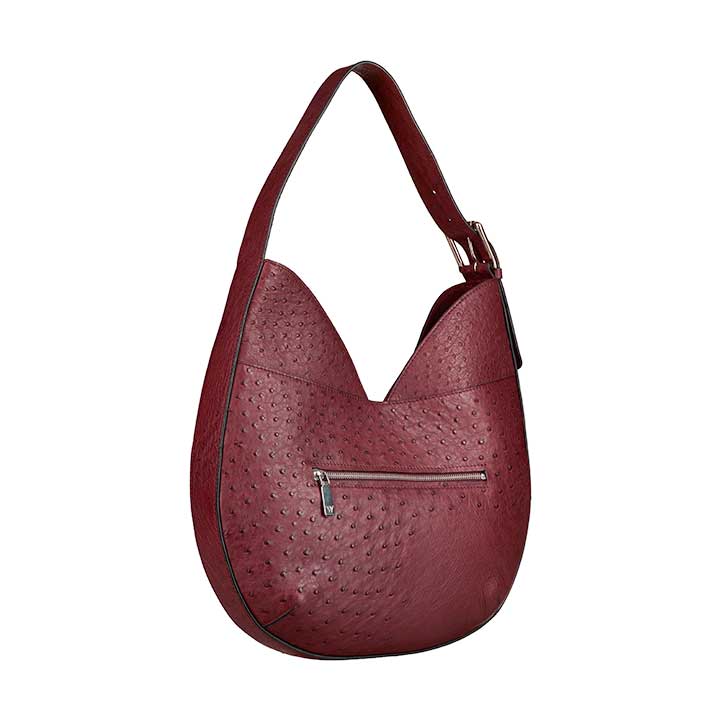 Red handbag with a textured pattern on a white background