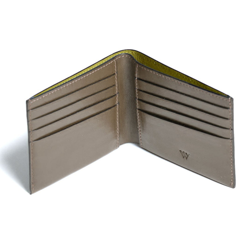 Open beige leather wallet with a brand logo on a white background