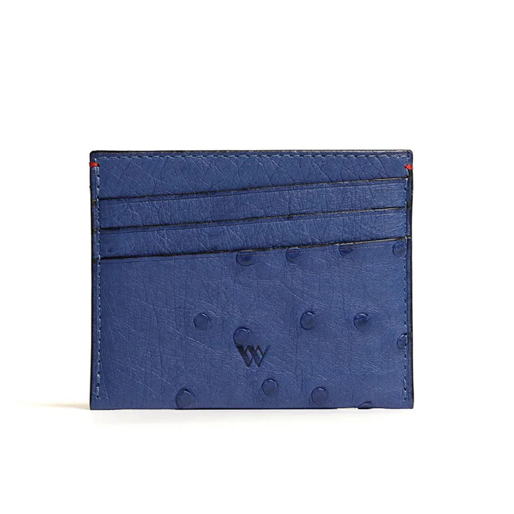 A blue card holder with multiple card slots and a small amount of cash, made from ostrich quill leather.