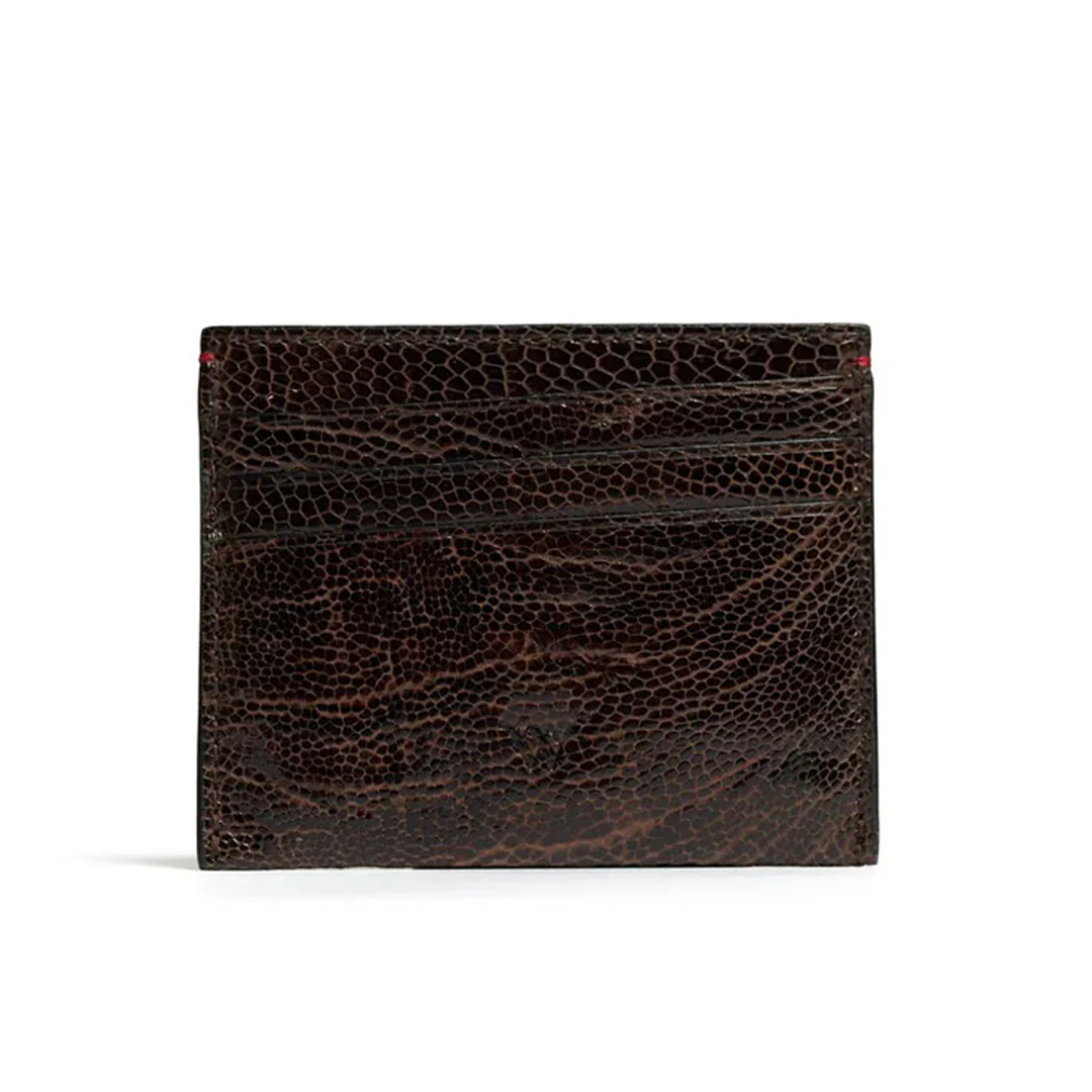 A brown leather card holder with multiple card slots and a cash compartment.