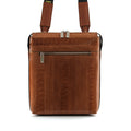 A brown premium ostrich leather satchel with a zipper pocket and a crossbody strap.