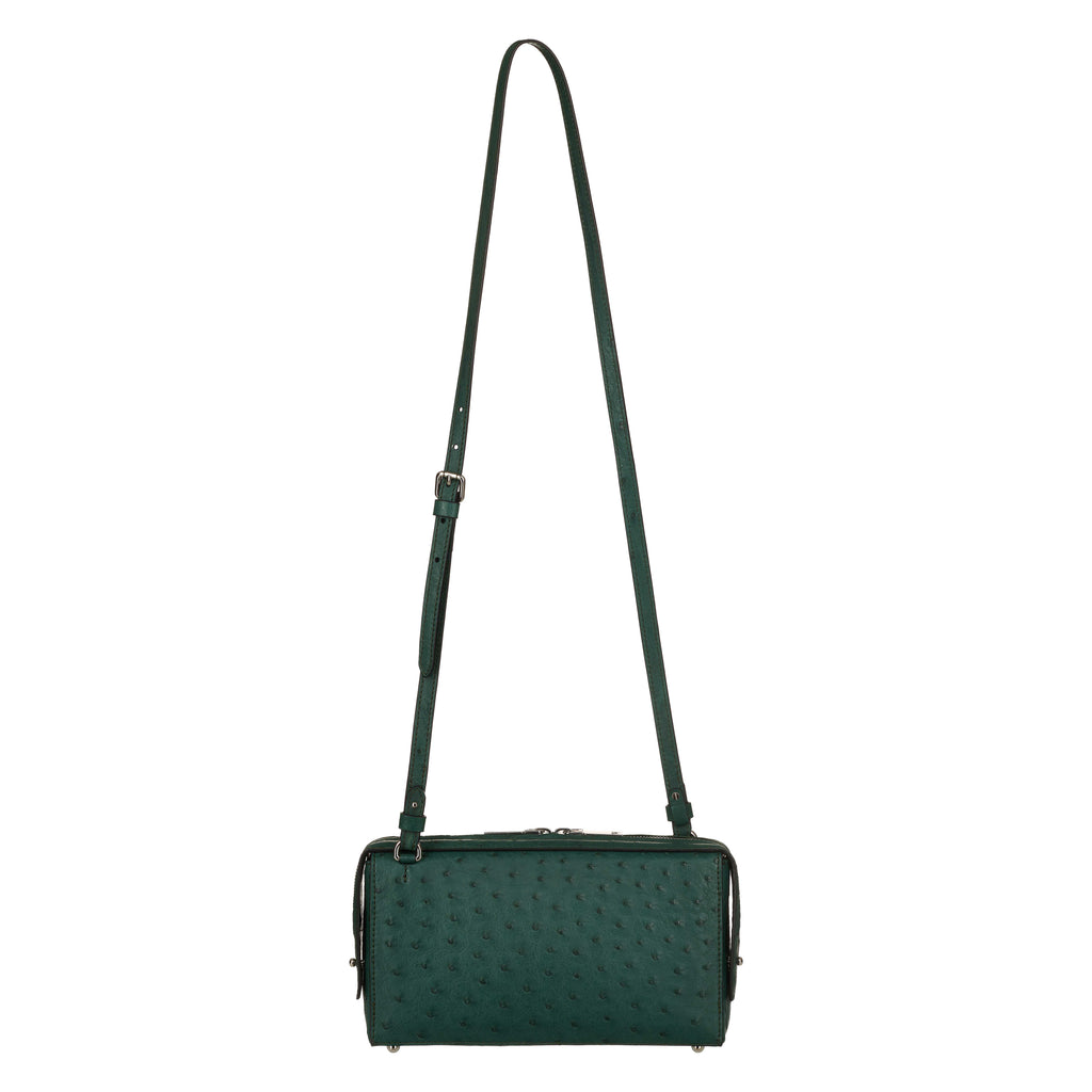 Green handbag with a strap on a white background