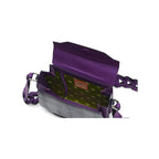 A grape purple leather handbag with a structured design, featuring a removable and adjustable link strap, a magnetic top closure, and a brand label on the interior.