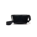 A black faux leather handbag with a structured design, featuring a removable and adjustable strap, a magnetic closure, and protective bottom studs.