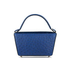 A mod blue leather handbag with a structured handle and a zippered top.