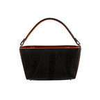 A black handbag with orange gussets and a removable brown strap, featuring a sleek and minimalistic design.