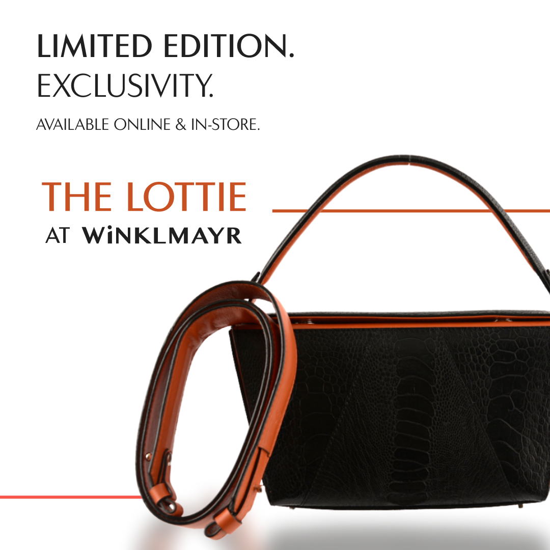 Lottie Black Limited Edition Ostrich Leather Crossbody Bag with Orange Gussets