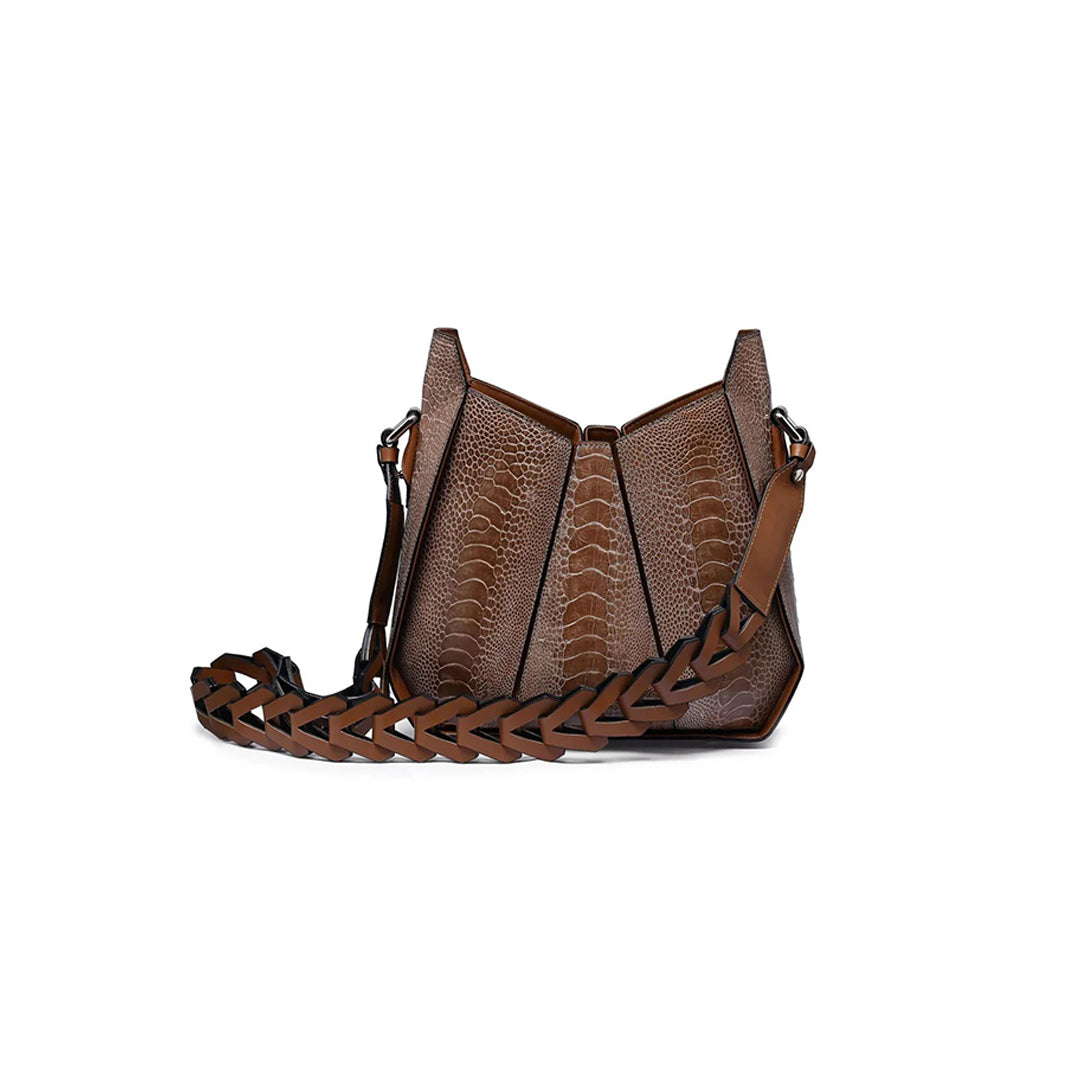 A brown, ostrich leg leather handbag with a structured geometric design, featuring a zippered compartment and a detachable strap.