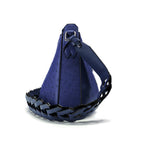 A blue ostrich leather shoulder bag with a braided leather base and strap, shown on a white background.