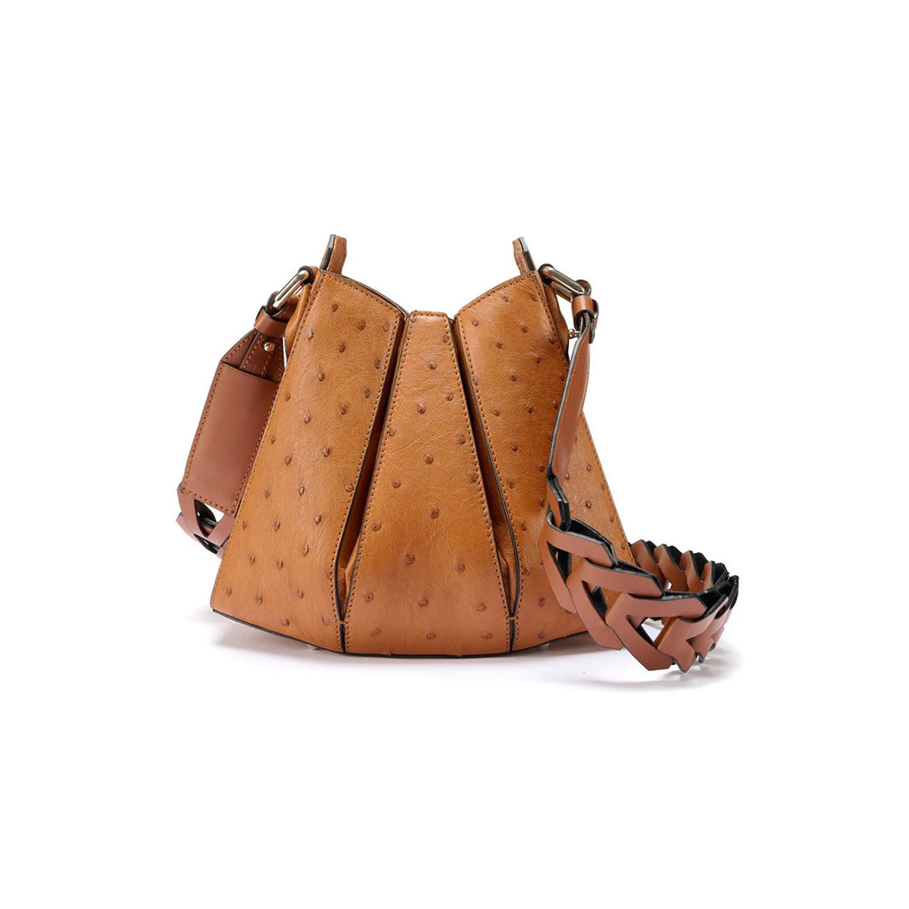 A brown, ostrich quill leather handbag with a textured pattern and a removable strap.