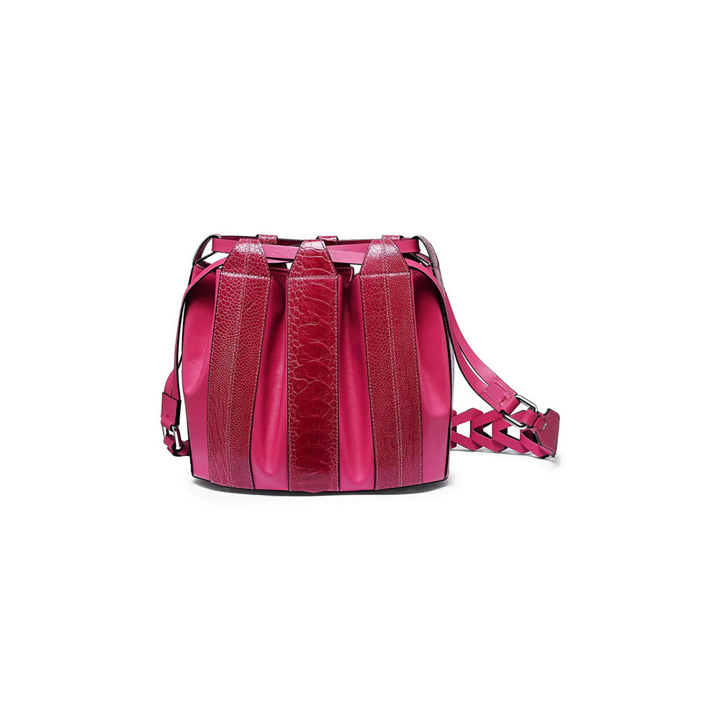 A pink handbag with a tulip shape and a soft drawstring closure, made from leather with visible stitching.