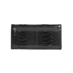 A black crocodile-embossed leather clutch wallet with a horizontal zippered pocket across the top, shown against a plain white background.