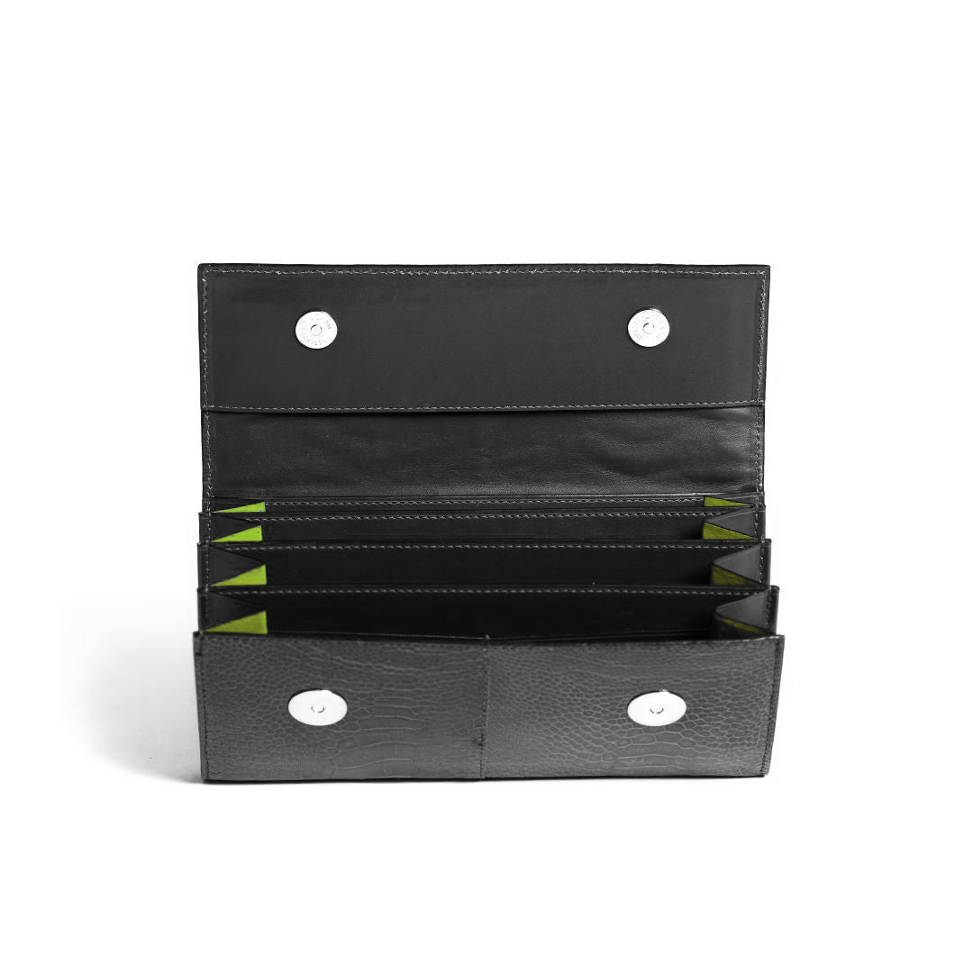 A black leather wallet shown open, featuring multiple card slots, a zip-around pocket, and silver snap buttons, photographed on a clean white background.