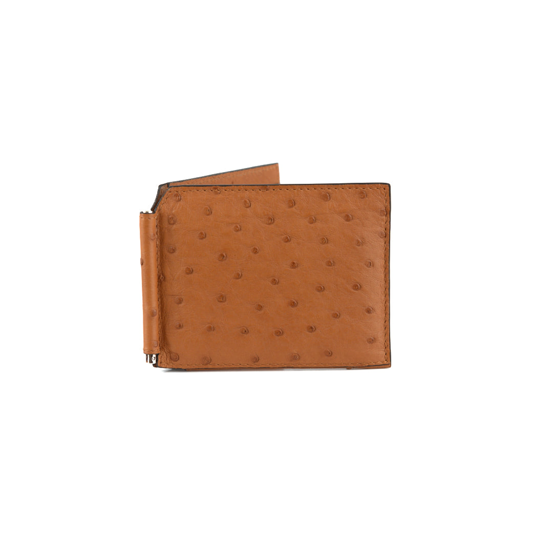 A brown leather wallet with a money clip and multiple card holders.
