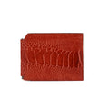Red leather wallet with crocodile texture on a white background