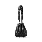 Black handbag with geometric design and braided handle on a white background